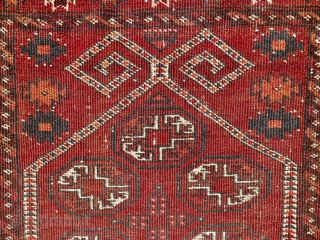 An Antique Ersari (Beshir) Prayer rug with ram's horn design. 112 x 84 cm (3.7ft x 2.75ft.) The border with" dogajik" motifs with a nice, natural rusty orange colour.    