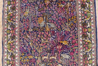 Kerman/ Kirman Ravar, Garden of Paradise rug.  7.8 ft x 4.8ft. (238 x 146 cm.) early 20 th. century.
Extraordinary composition with lavish details of flowers, birds, trotting deer, a lion and  ...