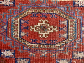 Exceptional fine and old Tekke chuval fragment. 100 x 58 cm. Before 1850. Six turreted Salor gul design with each gul outlined in indigo blue or blue-green. "Sarach-Palak" secondary gul with each  ...