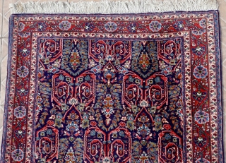 A fine Bidjar Garrus rug 148 x 102 cm (4.8 x 3.3ft) around 1960/70
with an arabesque calyx leaf design on a dark blue ground         