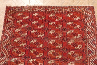 Kızıl Ayak main carpet, 8.5ft x 6.6ft late 19 th. Century. Characteristic "Tauk Nuska" design with facing horned animals.
Slight overall wear with areas of wear and one (old) repair.    