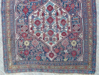 Qashqai Rug 3.4 ft. x 5.1ft. (104 x 156 cm) late 19 th. century Twin medallion type with poppy flowers and other floral motifs. tight weave. Fabulous colours: cherry red, mustard yellow,  ...