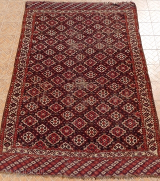 Chaudor/ Chodor Main Carpet, 11ft x 7.7ft. (335 x 235 cm.) late 19 th. century. Characteristic Ertmen Gol design on dark purple-brown ground. SOLD!
         