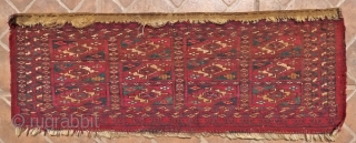 Tekke Mafrash, 72 x 26 cm. 19 th. Cent.  The design with 12 Tekke Chuval Gols. Pink silk and white cotton accentuations. Fine weave (circa 5,300 knots per sq. dm.) No  ...
