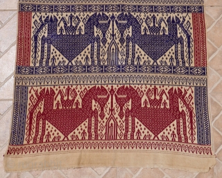 An antique ship cloth (Tampan) 70 x 93 cm. 19 th. century
Woven on cotton by tribal Paminggir people, Lampung, South Sumatra. The design with triple rows of ships in the shape of  ...