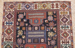 Shirvan 'Throne' Rug, Shemakha district, Maraza village. 185 x 114 cm. ( 6ft x 3.7ft) around 1910.  The design with two opposing "Thrones"  with a central squarish medallion on a  ...