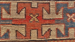 Kazak Rug, Bordjalou region, SE Caucasus, 215 x 11 cm. (7.05ft x 3.7ft) Probably 3 rd. qtr. of 19 th century. The design with a column of latch-hooked diamonds on a dark  ...