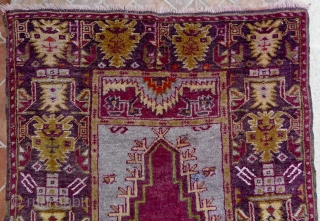 Çamardı/Niğde Prayer rug, Maden region, Central Anatolian. 5.3ft x 3.4ft (163 x 105 cm.) Circa 1930
Atractive rug with magenta red prayer niche on a pale blue ground. Border design with large palmettes  ...