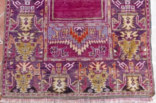 Çamardı/Niğde Prayer rug, Maden region, Central Anatolian. 5.3ft x 3.4ft (163 x 105 cm.) Circa 1930
Atractive rug with magenta red prayer niche on a pale blue ground. Border design with large palmettes  ...