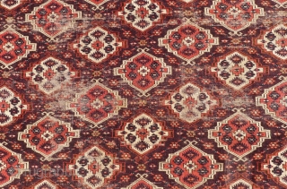 Chaudor/ Chodor Main Carpet, 11ft x 7.7ft. (335 x 235 cm.)
late 19 th. century. Characteristic Ertmen Gol design on dark purple-brown ground.
$850 USD plus $75 P&P (insured)      