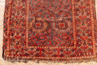 A Beshir Cloudband Main Carpet, Amu Darya region, Turkestan.  348 x 154 cm. 3rd. qtr. 19 th. century.
A few areas of wear and (corner) repair.
       