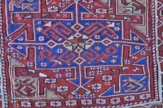 Bergama Rug, NW coastal Turkey, 108 x 95 cm. 1850 or earlier.
The design with two cruciform medallions.
Beautiful proportion of indigo blue, ivory and pistache green on a madder red ground.
Attractive white ground  ...