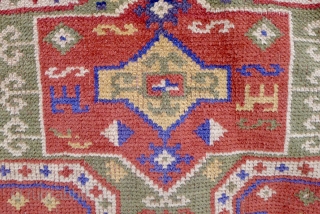 Sewan Kazak, Bordjalou region, 180 x 130cm. (5.9ft x 4.25ft) ca. 1900. The design with a large  mint-green cruciform medallion on a brick-red ground. The main border with a row of  ...