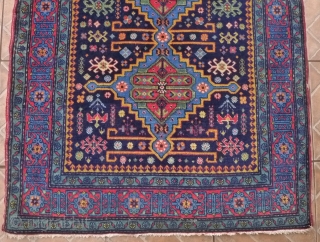 An Ugakh Kuba Rug, Divichi district, Azerbaijan. 158 x 96cm. (5.2ft x 3.15ft) ca. 1920/30 The dark blue field with
three stepped lozenges in sky blue, divided by golden yellow rods. Classic kufic  ...