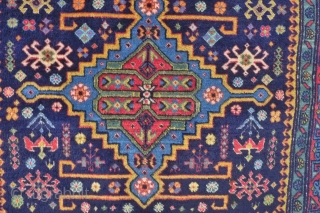 An Ugakh Kuba Rug, Divichi district, Azerbaijan. 158 x 96cm. (5.2ft x 3.15ft) ca. 1920/30 The dark blue field with
three stepped lozenges in sky blue, divided by golden yellow rods. Classic kufic  ...