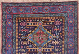 An Ugakh Kuba Rug, Divichi district, Azerbaijan. 158 x 96cm. (5.2ft x 3.15ft) ca. 1920/30 The dark blue field with
three stepped lozenges in sky blue, divided by golden yellow rods. Classic kufic  ...