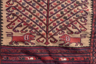 A Baluch flatwoven Balisht bagface,  ca. 1940- 1950
Tree of life design flanked by lions (Shir o Khorshid) motifs on a camel ground, natural dyed colours.       