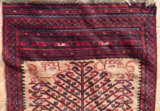 A Baluch flatwoven Balisht bagface,  ca. 1940- 1950
Tree of life design flanked by lions (Shir o Khorshid) motifs on a camel ground, natural dyed colours.       