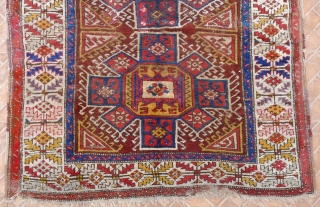 West Anatolian Bergama area rug, 4.7x5.3ft. mid 19 th. cenury. The design with two octagonal eight pointed star motifs (Holbein type)
Classic border with diamond and serrated leaf pattern. Condition: areas of wear  ...