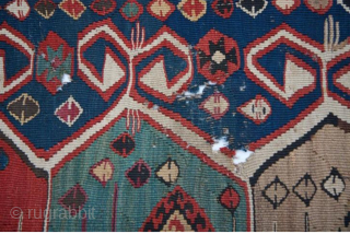 Antique Caucasian Kilim Fragment

Antique Caucasian kilim - Kelim fragment featuring traditional geometric motifs and vibrant colors. Shows signs of age with small holes and wear.

Size: 198 × 137 cm
    