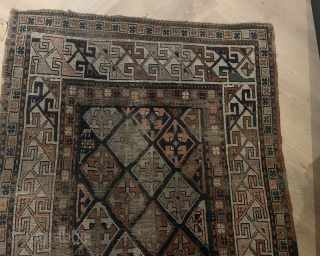 Caucasian Shirvan Rug – Worn/Distressed Condition – 241 × 106 cm
Beautiful antique Shirvan rug with classic geometric motifs and a naturally aged, distressed look.