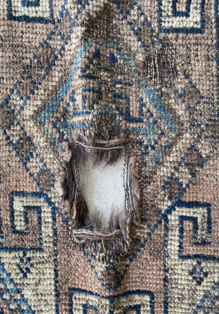 Very old Qashqai rug with goathair foundation. Circa 1900s maybe older. Size is 155 x 215 cm. There is a hole in the field of the rug and ends are worn. Contact: ...