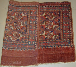 Monumental Yomud Chuval 50'' X 31''(127 X 79cm), early 19th. century, corrosive insect dye highlights, original side cords
               