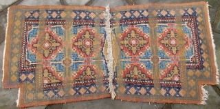 Gansu Saddle Cover, late 19th. early 20th. century, mint condition, please note minor areas of glue on back (probably removable) 50" X 24"(122 X 61cm)        