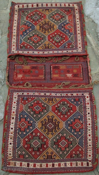 Azeri pair of Saddle Bags, Karabagh, original side cords, various types of weft float brocading, vertical wrapping, & a form of weft-twining, overall dimensions, 50" X 23"[127 X 59cm], 19th. century, see  ...