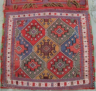 Azeri pair of Saddle Bags, Karabagh, original side cords, various types of weft float brocading, vertical wrapping, & a form of weft-twining, overall dimensions, 50" X 23"[127 X 59cm], 19th. century, see  ...