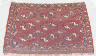  Yomud Chuval with unusual rare gul interiors, finely woven with beautiful colors, early 19th. century, 37'' X 24''(94 X 60cm).            