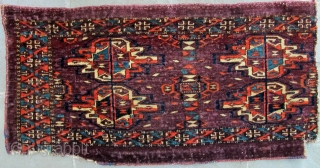 Important and beautiful very finely woven early Turkmen Khalyk fragment;
glorious colors set off by the deep aubergine ground.  Piece is lacking
the bottom appendages and the border on the right side which  ...