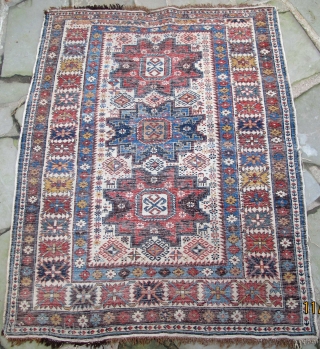 Finely woven Daghestan, Caucasus, original selvedges, original kelim end finishes with knotted warps, plethora of natural dyes including a wonderful maroon,19th. century, 56" X 45"[143 X 114cm]      