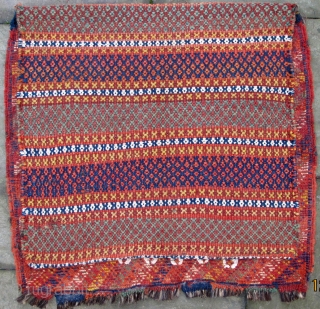 Unusual colorful full pile W. Persian bag complete with original complex embroidered weft-float back woven
originally in the weaving process, remnants of closures visible below in image of back, small hole bottom right,
19th.  ...
