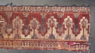 Ruinous reciprocal design border fragment.  The good frags of this rug have gone to some good collections.  Approx 1' x 3'.          