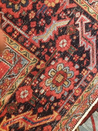 Antique Persian Heriz Circa 1900. Measures 9'-7" x 12' . Low even flat pile shows wear no tear or holes, both ends are intact.         