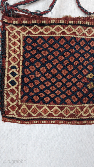  A Dynamic finely woven small Afshar chanteh (personal bag) from E.Persia, circa 1900 or before in soumak weave. It has a beautiful range of all-natural dyes, with a wonderful multi-color original  ...
