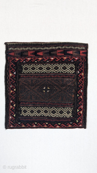 Antique finely woven Baluch chanteh bag circa 1910 or before, with unusual greens, and silk highlights. the chanteh is a beautiful example of baluch tribal weaving with a wonderful range of dyes,  ...