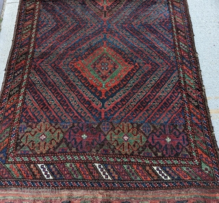 A marvelous antique Baluch rug, from the Sistan region of SE Persia. This one is in excellent condition, with full pile, and original kilim ends. Shimmering colours that come alive in natural  ...