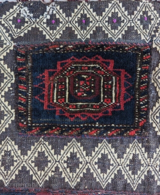 A fine Baluch chanteh, with mixed technique (piled knotting and various flatweave techniques). Silk highlights. Very uncommon. Good condition. Size: 13" x 13".          