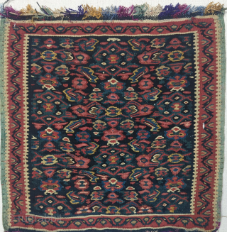 A finely woven  Antique Senneh Kurd small kilim, maybe a Vegirah( sampler), with multi colored silk warp. 
It's made with  gorgeous array of all natural dyes, with the outer edge  ...