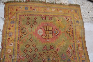 Antique Ushak Carpet,	
Age:Antique,
Origin: Turkish	
City/Village: 	Ushak,
Size cm: 	370 x 123 -
Size ft: 	12'4 x 4'1 -
Code No: 	R5992 -
Availability: 	In Stock - This rug is over hundred years old and some major damage 