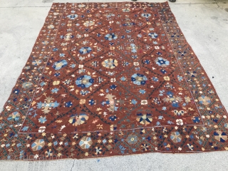 Rare color Bokhara Suzani

Rust color hand woven linen background with lattice and floral patterns, Over all chain stitch used predominately for design except a few areas of basma stitch. Nine colors of:  ...