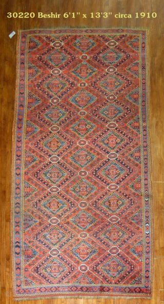 Antique Ersari.  Size is 6'1''x13'3''.

  I am not an expert with these things.  Bought this cause it was attractive.  Lower areas towards center of rug.  In my  ...