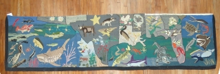 A rare American Hooked rug from the early part of the 20th century showing the southern part of the United States with various different type of animals.  Size is 3'x13' Condition  ...