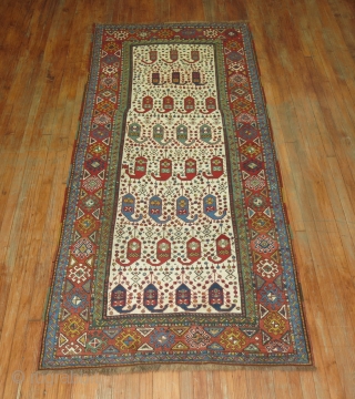 Antique Vivid Ivory Kazak 4'x8'10''.  BOught as is..  Cannot see any repairs.  If done they were impeccable.             