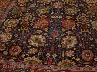 A very boldly executed Sultanabad/Arak area "vase design" carpet with a very legible inscription cartouche and dated 1305 Hijri = 1878 A.D. Approximately 9'6" X 10" with mostly medium to low pile  ...