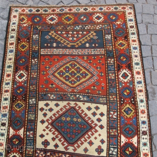 Antique Kasak carpet, excellent condition, all vegetable colours, %5 repaired, no any hole, just little control. 
Size: 90 x 46 inches (2,29 x 1,16 cm). 
Circa 1890's.      