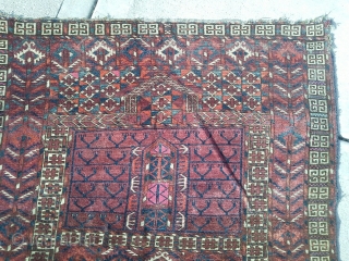 Late 19th century Tekke 43"x 57". Pile is good, there are very minor moth damage in the field. See pix for other damage. Dyes look natural, asymmetrical knot.
     