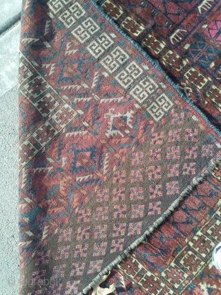 Late 19th century Tekke 43"x 57". Pile is good, there are very minor moth damage in the field. See pix for other damage. Dyes look natural, asymmetrical knot.
     